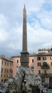 ountain of the four Rivers with Egyptian obelisk, in the middle of Piazza Navona, Rome, Italy